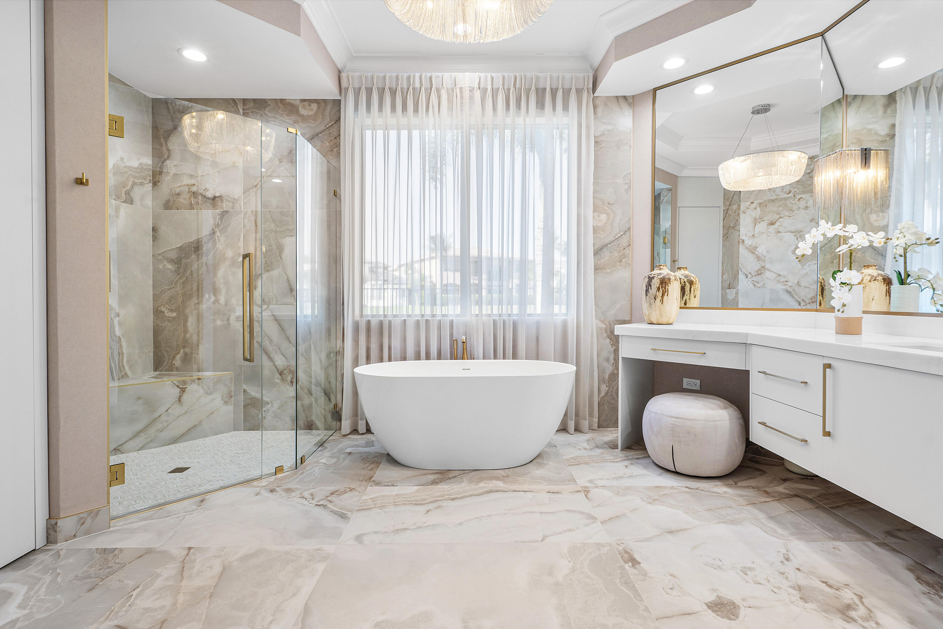 17709 Circle Pond Court Boca Raton, FL 33496 - Photo 23 of 50 a bathroom with a bathtub and shower