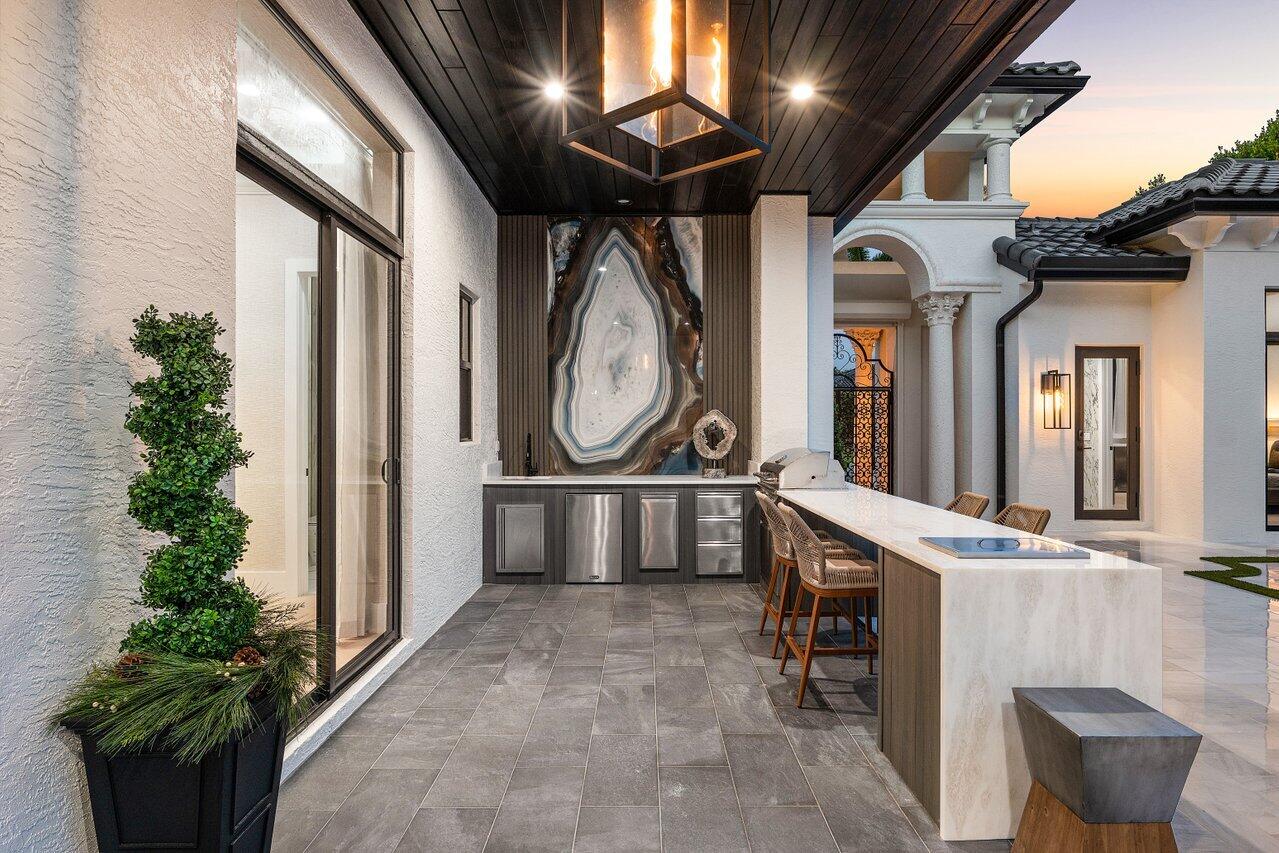 17709 Circle Pond Court Boca Raton, FL 33496 - Photo 45 of 50 a front view of a house with garden