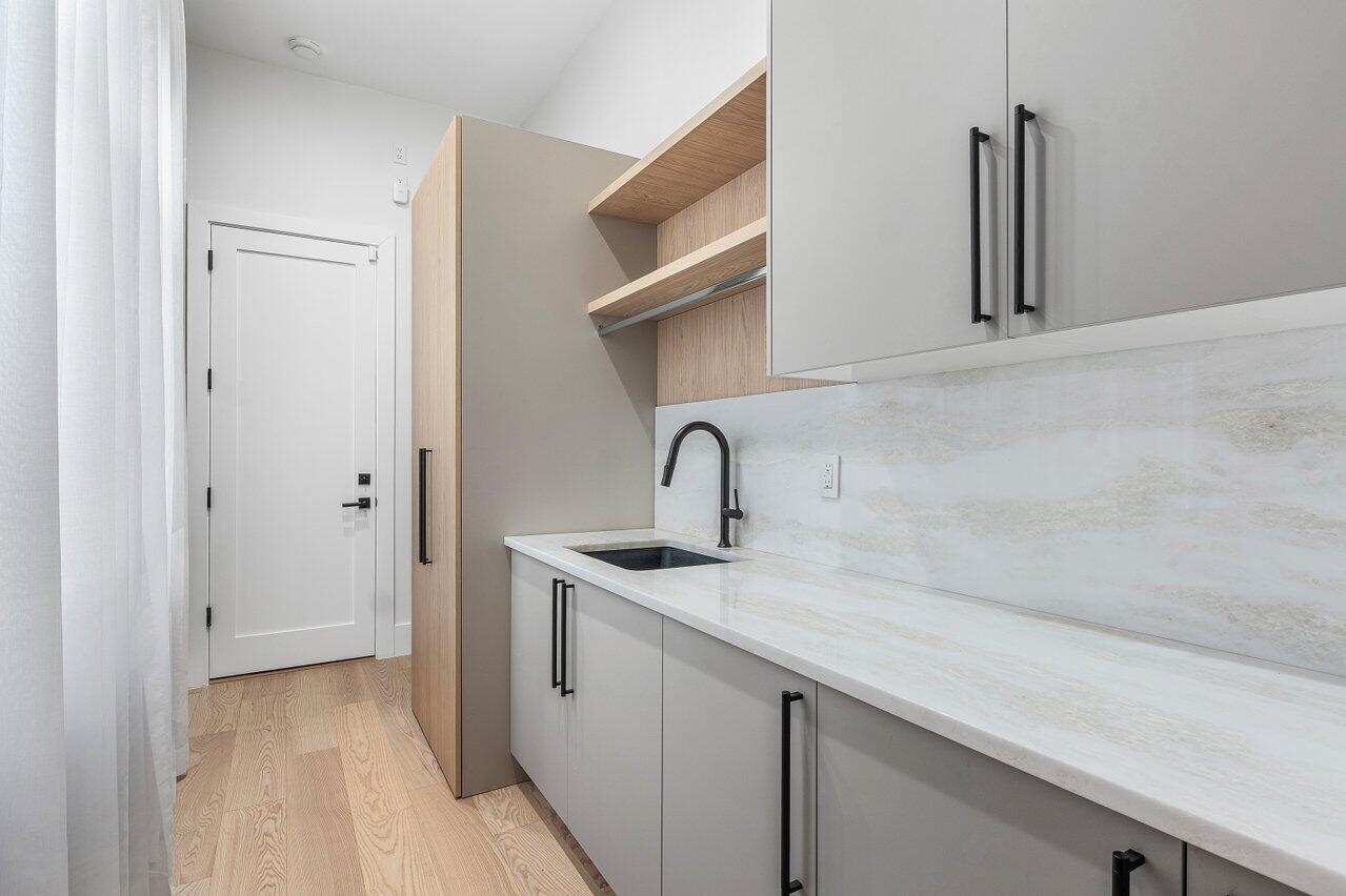 17709 Circle Pond Court Boca Raton, FL 33496 - Photo 50 of 50 a kitchen with a sink and cabinets
