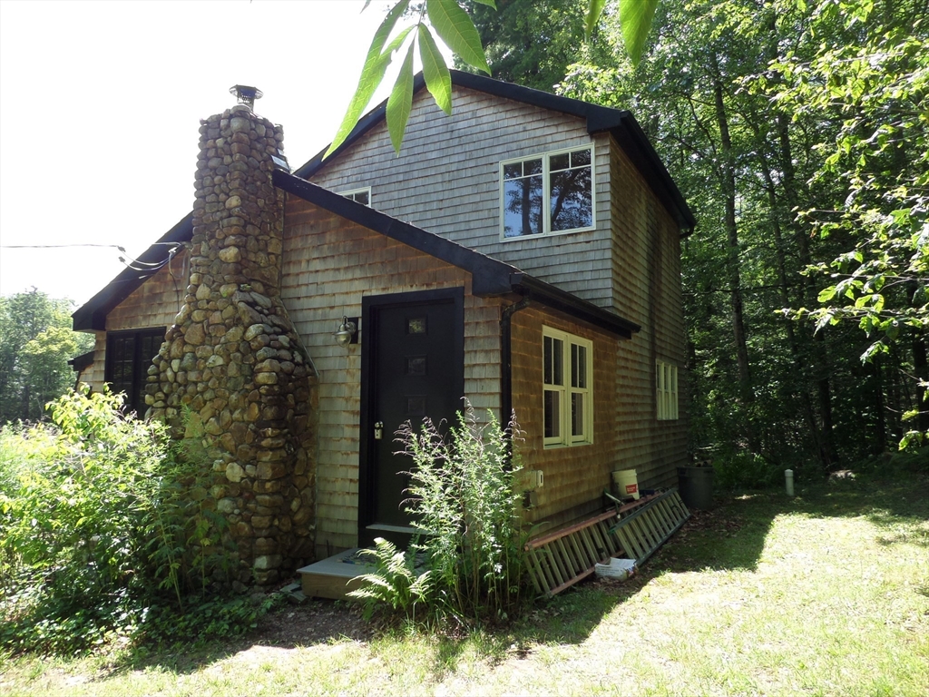 269 River Road Worthington, MA 01098 - Photo 4 of 32 a view of a house with a yard