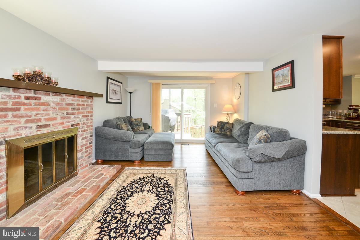 9913 Coffer Woods Road Burke, VA 22015 - Photo 7 of 26 Brick Hearth FP & SGD opens to deck