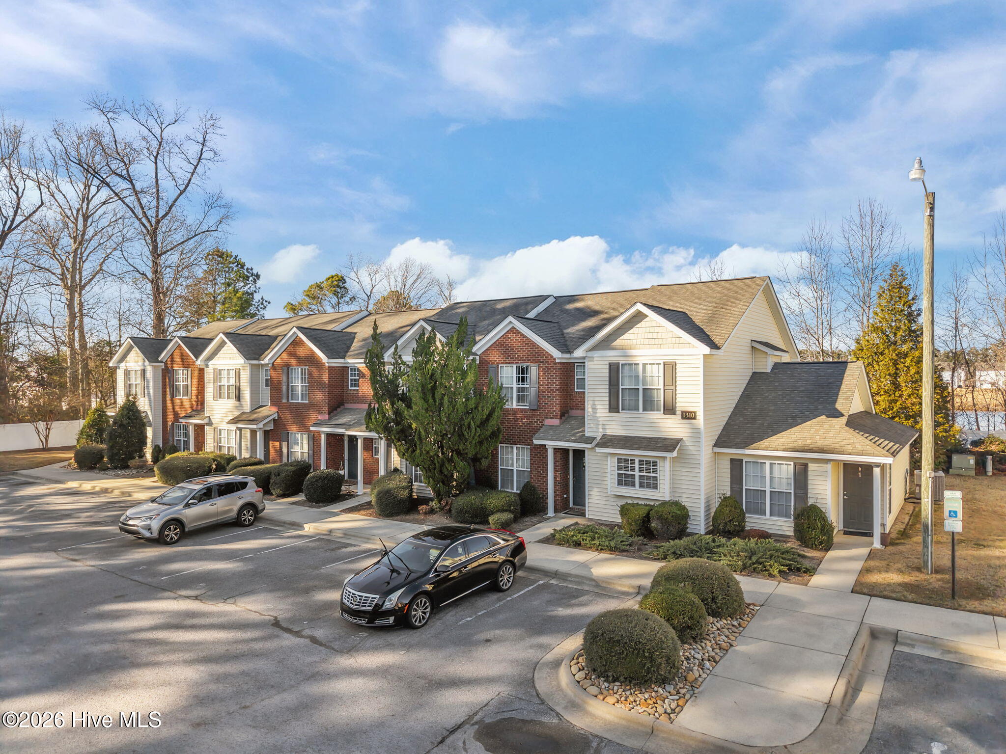 1310 Thomas Langston Road, Unit 6 Greenville, NC 27834 - Photo 3 of 25 4-web-or-mls-DJI_20260127150050_0032_D