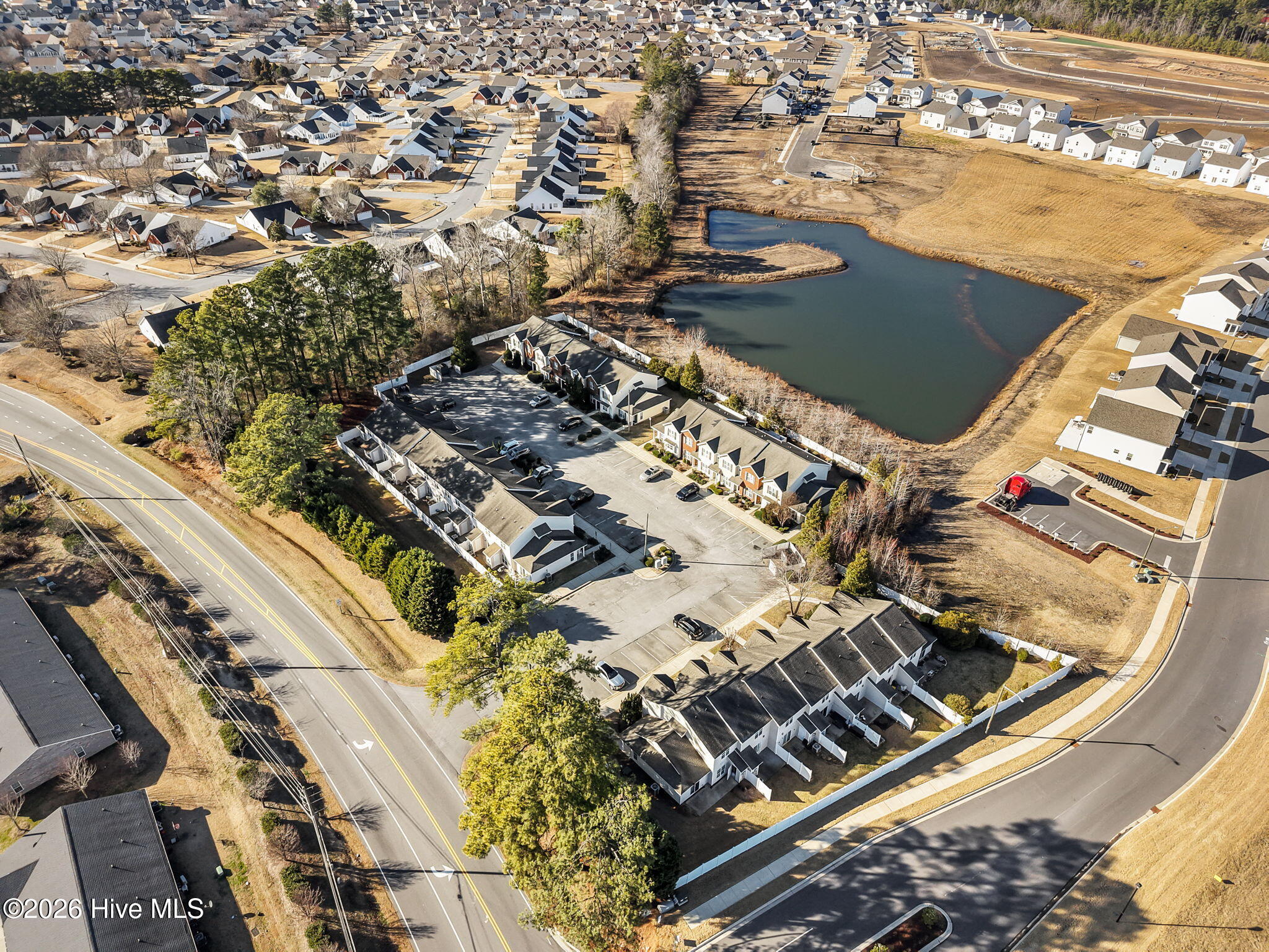 1310 Thomas Langston Road, Unit 6 Greenville, NC 27834 - Photo 4 of 25 23-web-or-mls-DJI_20260127150146_0036_D