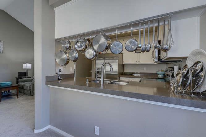 108 Arbor Way Milpitas, CA 95035 - Photo 14 of 26 a kitchen with stainless steel appliances granite countertop a sink and a stove