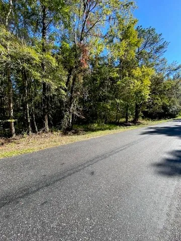 a view of an outdoor space and a yard