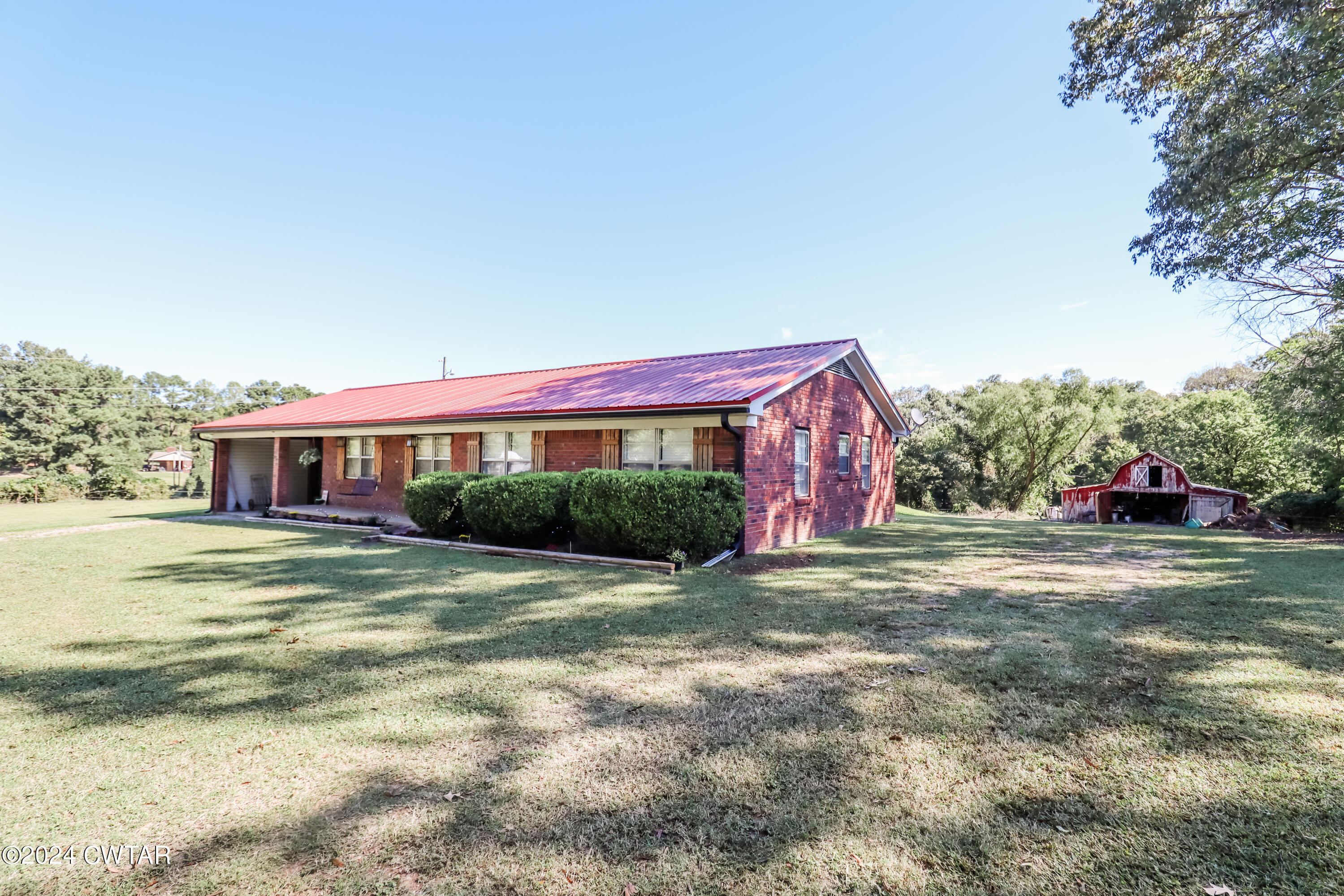 2046 Barlow Road Ripley, TN 38063 - Photo 3 of 28 a view of a house with a yard