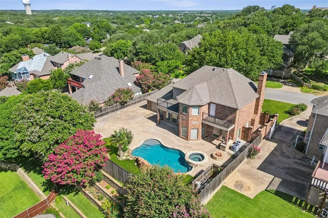an aerial view of a house with a garden