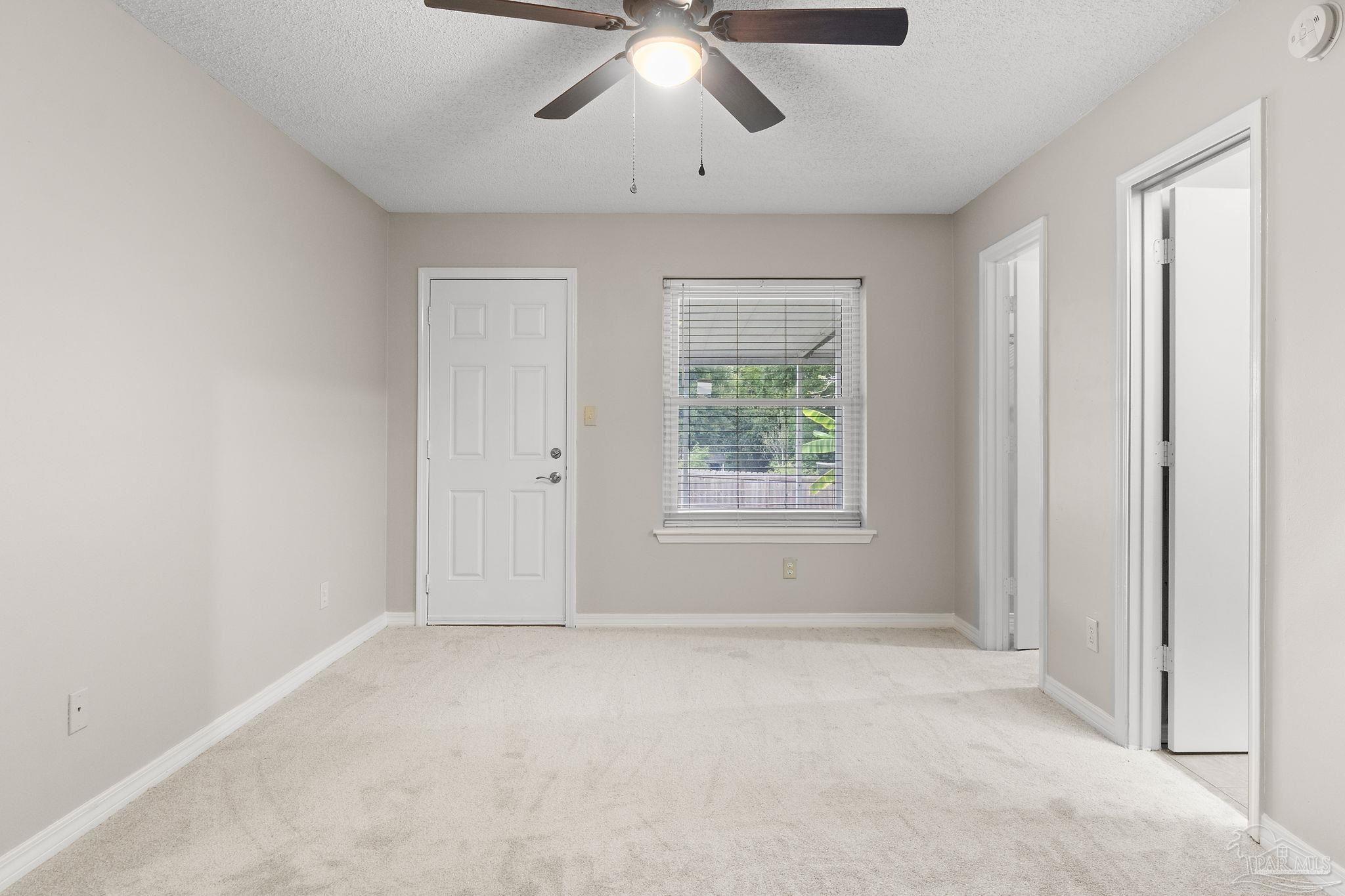 3440 Riverside Drive Pensacola, FL 32514 - Photo 13 of 26 an empty room with a window