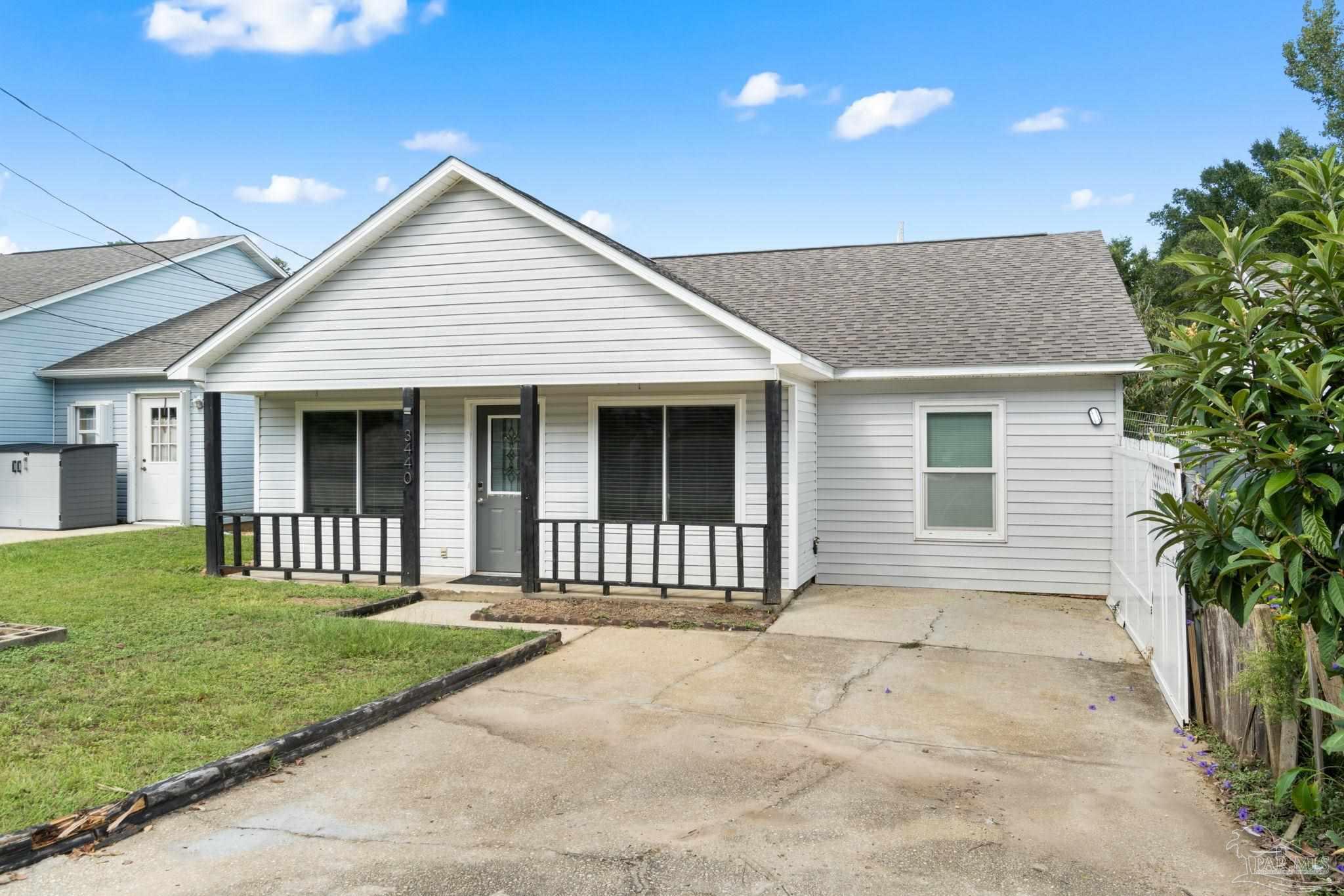 3440 Riverside Drive Pensacola, FL 32514 - Photo 2 of 26 a view of a house with garden