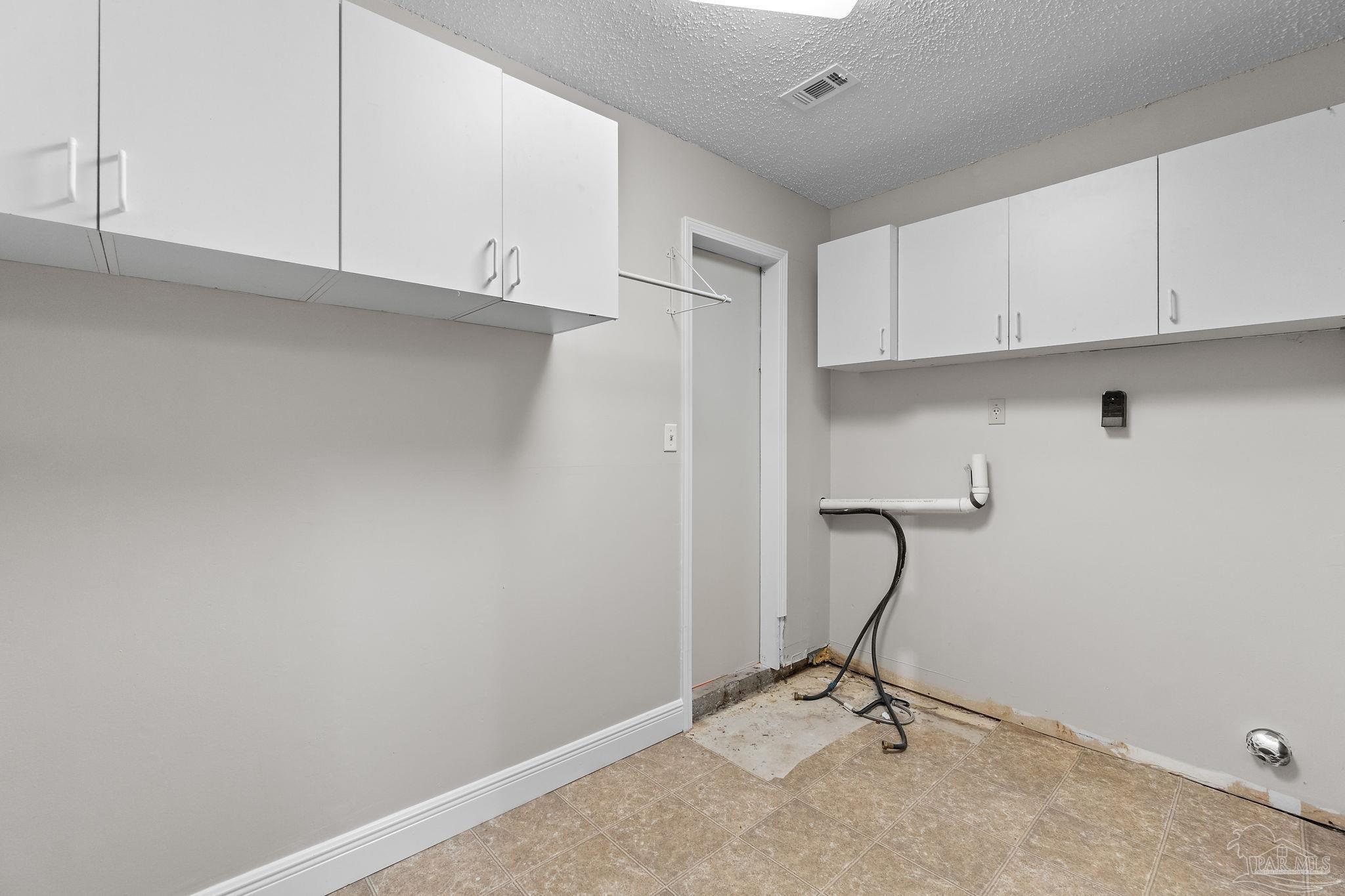 3440 Riverside Drive Pensacola, FL 32514 - Photo 23 of 26 a view of a room with gym equipment