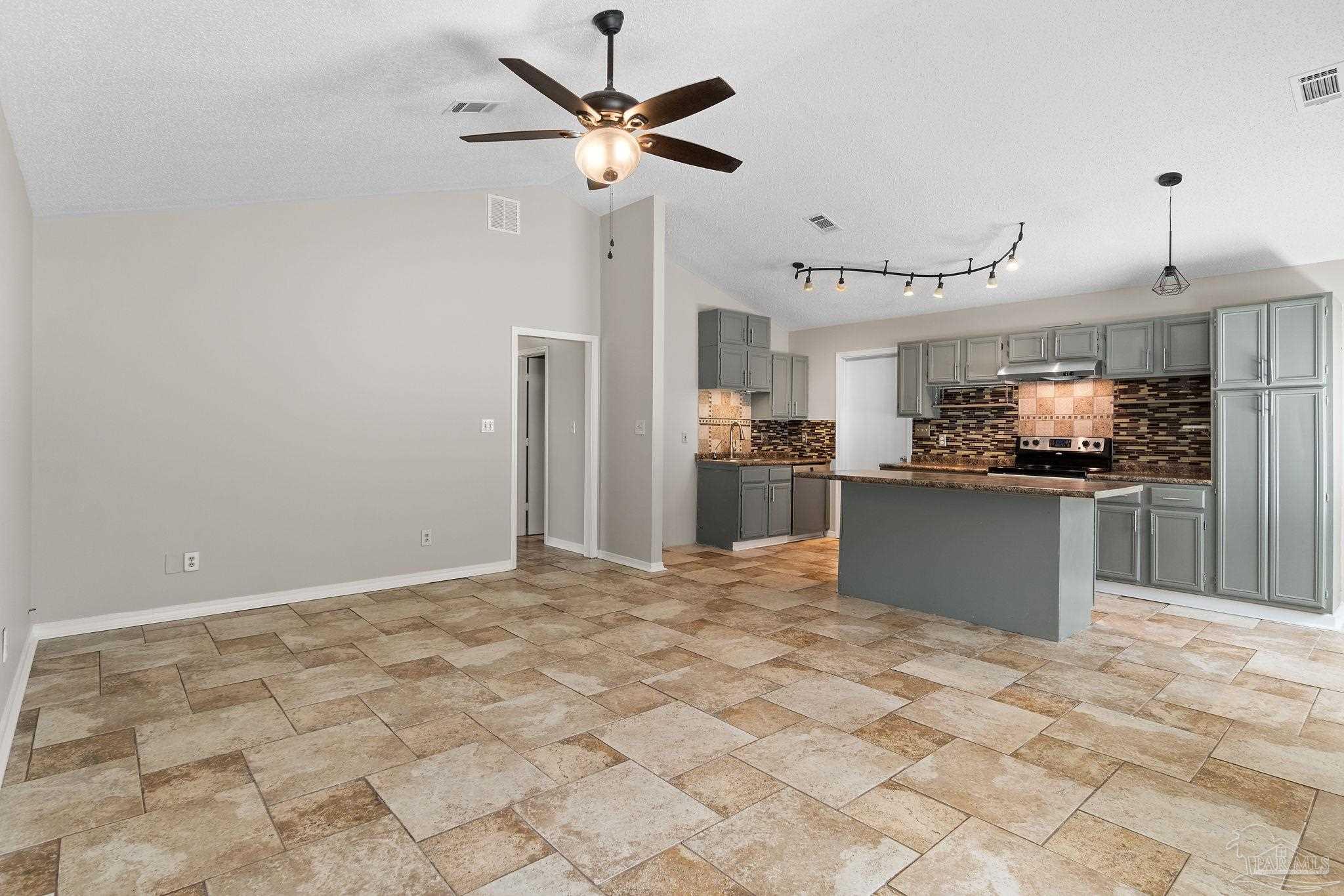 3440 Riverside Drive Pensacola, FL 32514 - Photo 4 of 26 a kitchen with stainless steel appliances granite countertop a refrigerator oven a sink and dishwasher