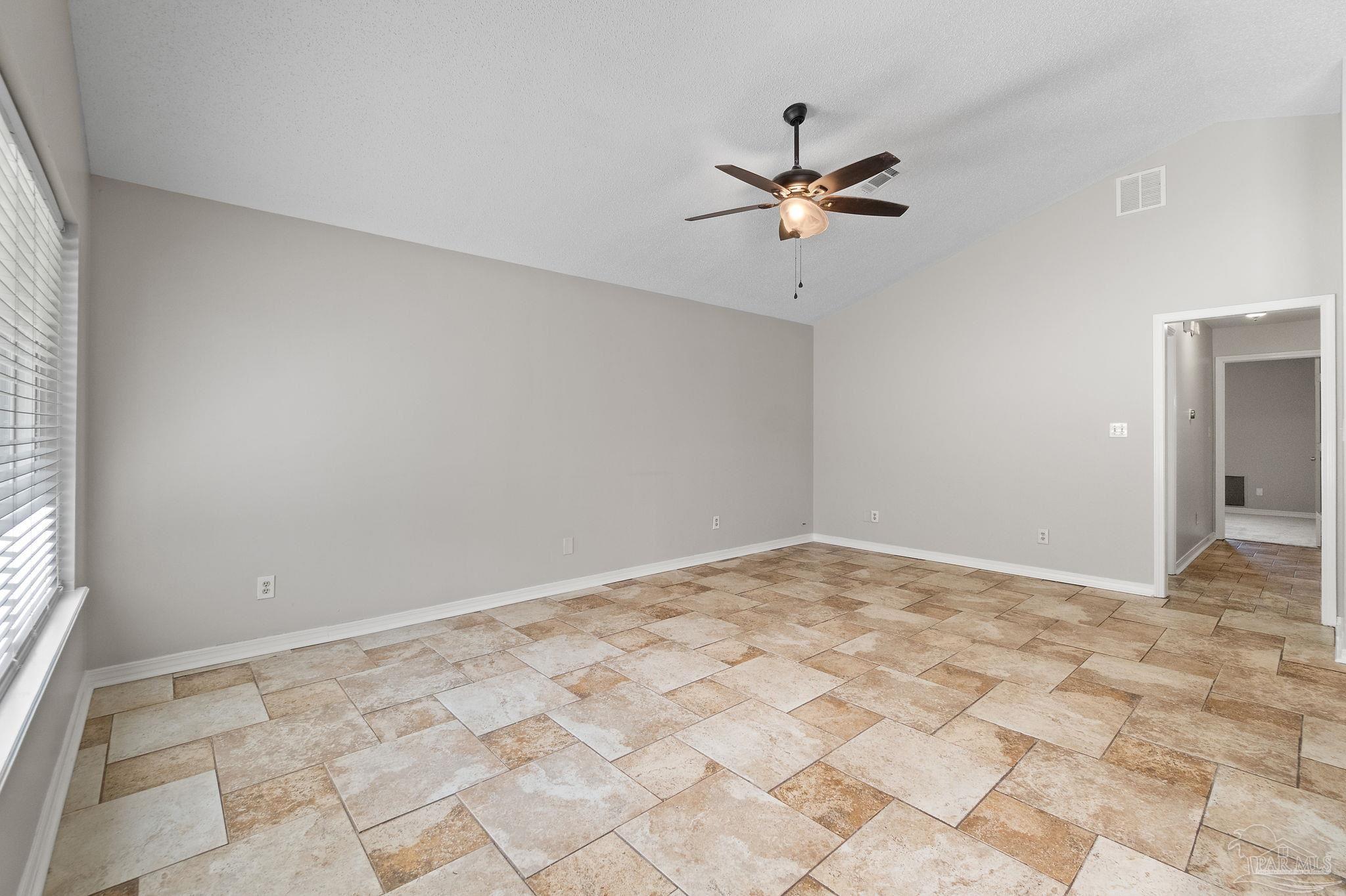 3440 Riverside Drive Pensacola, FL 32514 - Photo 6 of 26 a view of a ceiling fan in a room