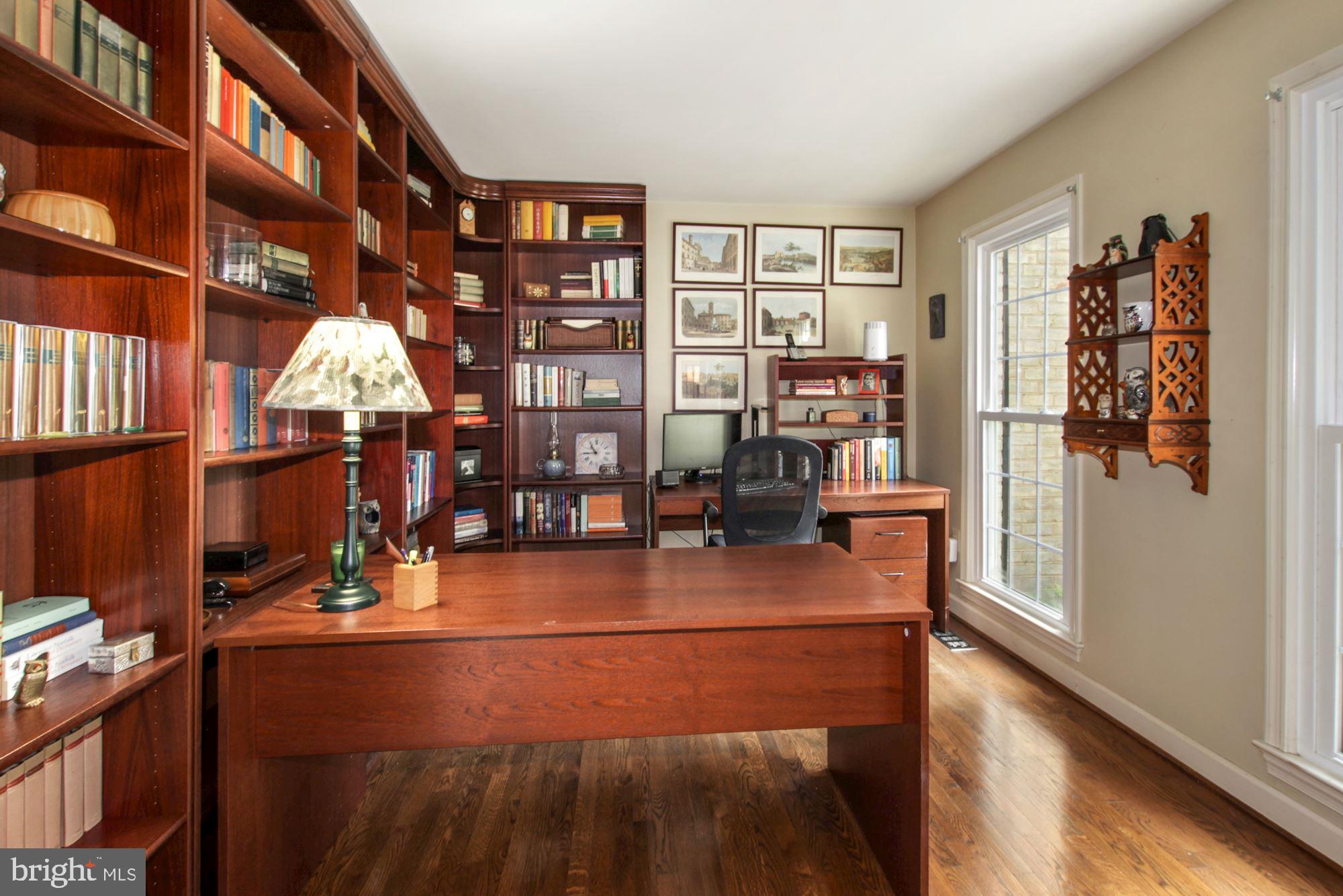 15309 Watergate Road Silver Spring, MD 20905 - Photo 5 of 43 Cozy library with custom bookcases