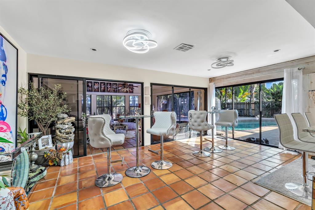 980 Southwest 70th Avenue Plantation, FL 33317 - Photo 20 of 42 a living room filled with furniture