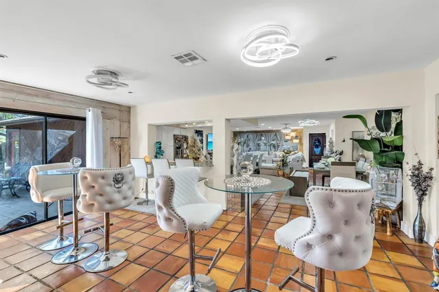 a view of a livingroom with furniture and a table