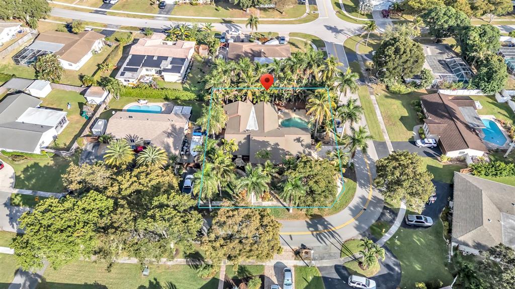 980 Southwest 70th Avenue Plantation, FL 33317 - Photo 5 of 42 an aerial view of a house with a yard