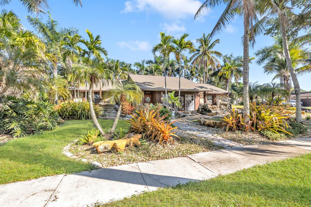 980 Southwest 70th Avenue Plantation, FL 33317 - Photo 7 of 42 a view of a park with plants and trees