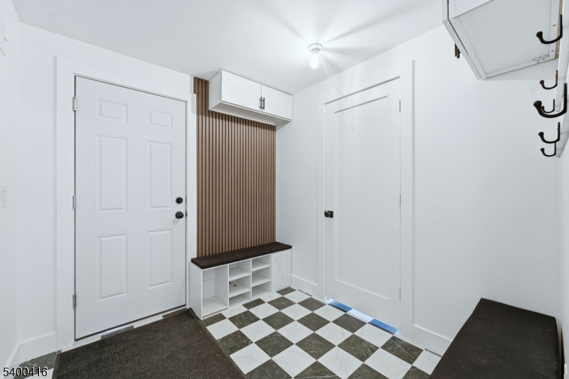 962 Brown Road Bridgewater, NJ 08807 - Photo 32 of 46 a bathroom with a mirror and a shower