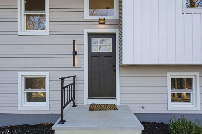 962 Brown Road Bridgewater, NJ 08807 - Photo 4 of 46 a front view of a house with white walls