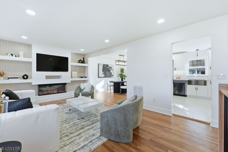 962 Brown Road Bridgewater, NJ 08807 - Photo 5 of 46 a living room with fireplace furniture and a flat screen tv