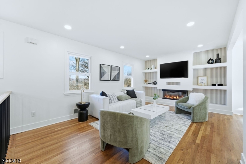 962 Brown Road Bridgewater, NJ 08807 - Photo 6 of 46 a living room with furniture and a flat screen tv