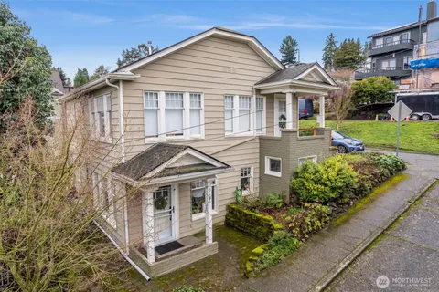 front view of a house with a small yard