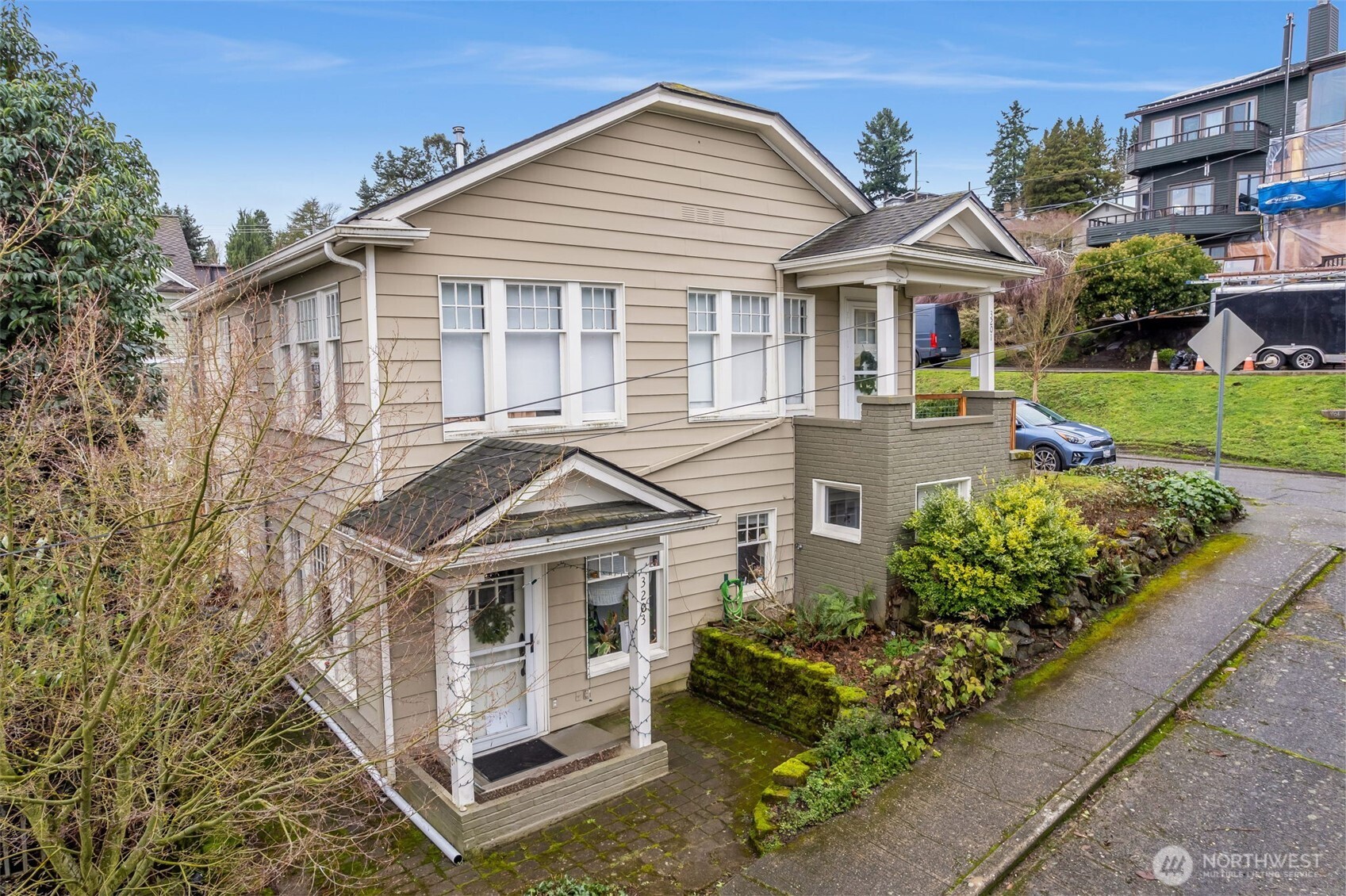3201 South Charles Street Seattle, WA 98144 - Photo 12 of 23 front view of a house with a small yard