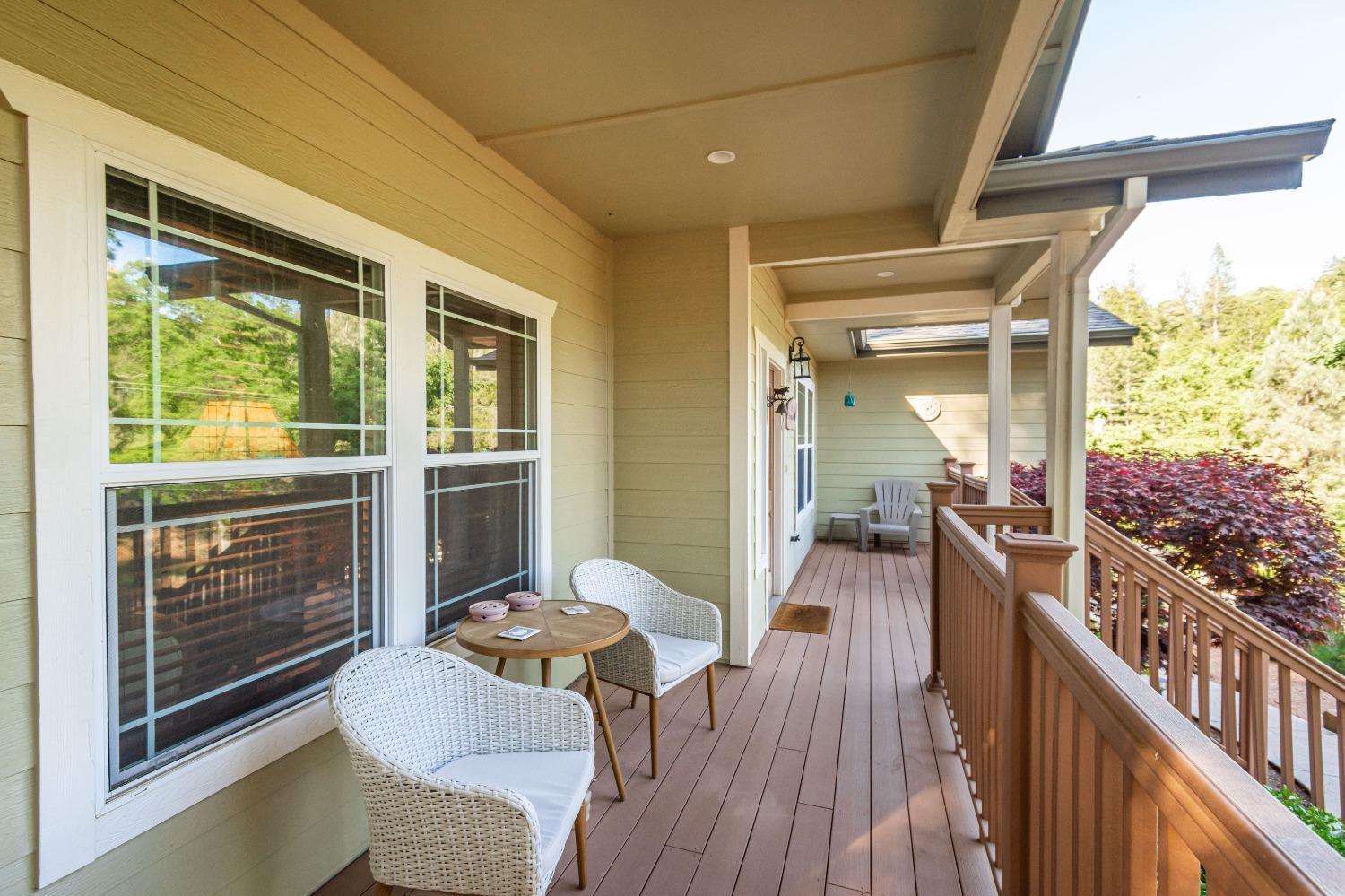 6570 Mosquito Road Placerville, CA 95667 - Photo 12 of 56 a view of a porch with furniture and wooden floor