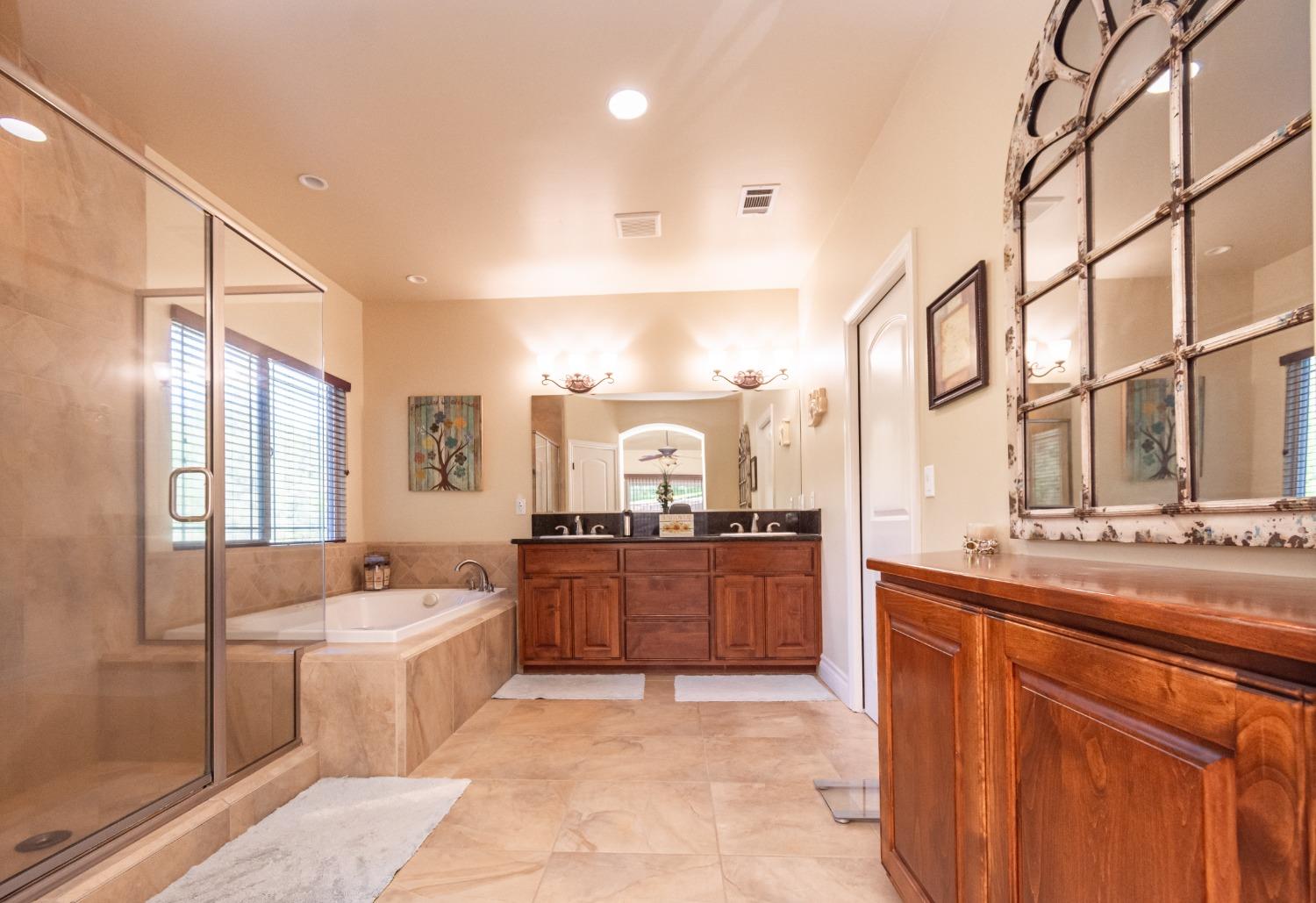 6570 Mosquito Road Placerville, CA 95667 - Photo 31 of 56 a large kitchen with stainless steel appliances a sink and cabinets