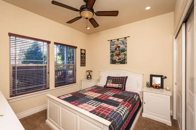a view of a dining room with furniture and a window