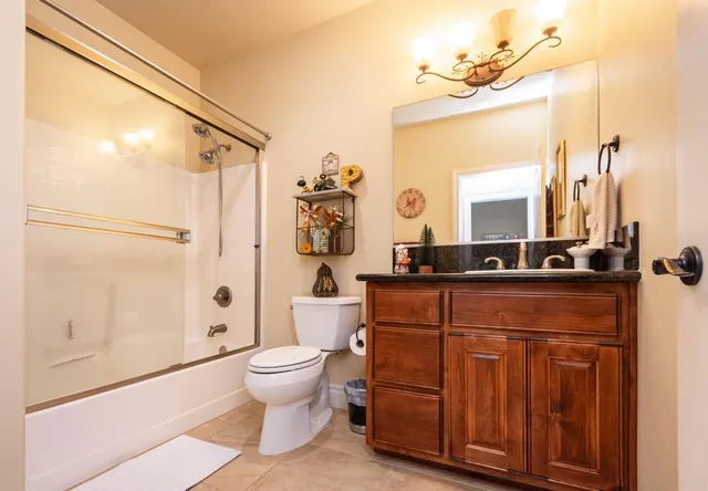 a front view of a house with sitting area