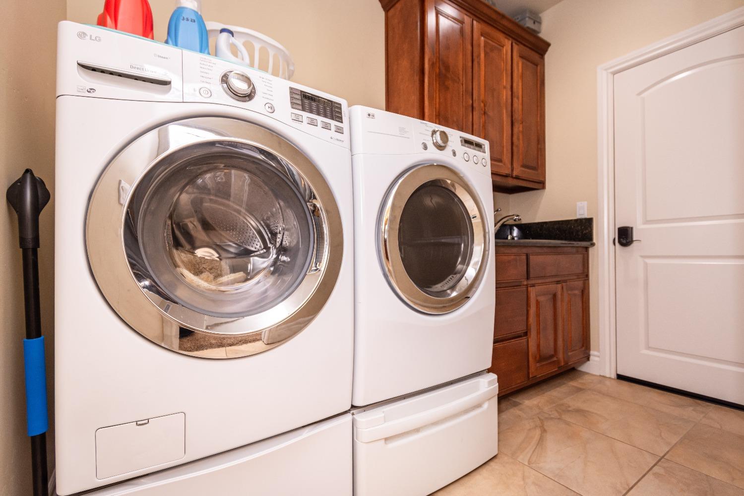6570 Mosquito Road Placerville, CA 95667 - Photo 39 of 56 a utility room with dryer and washer