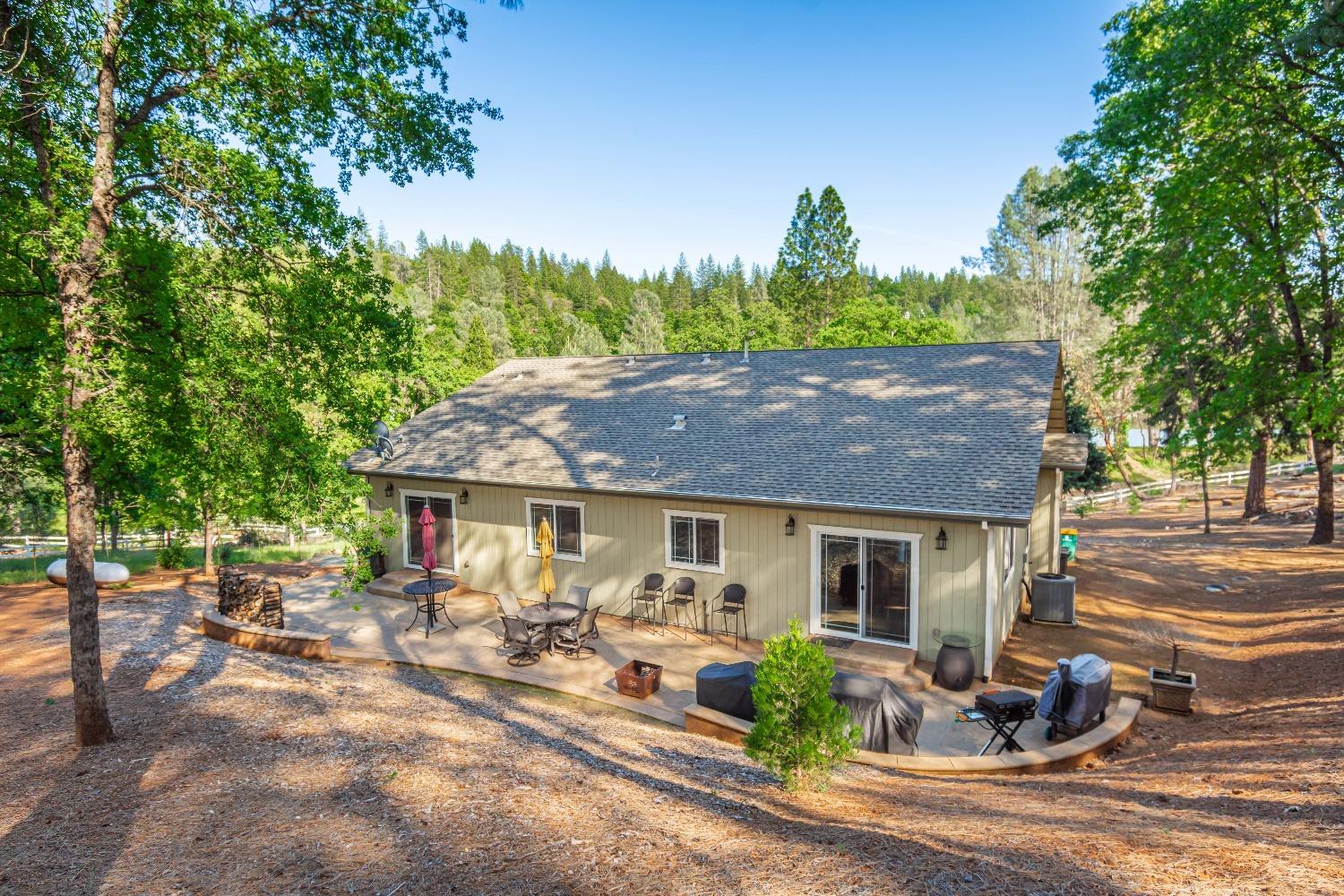 6570 Mosquito Road Placerville, CA 95667 - Photo 40 of 56 a front view of a house with sitting area