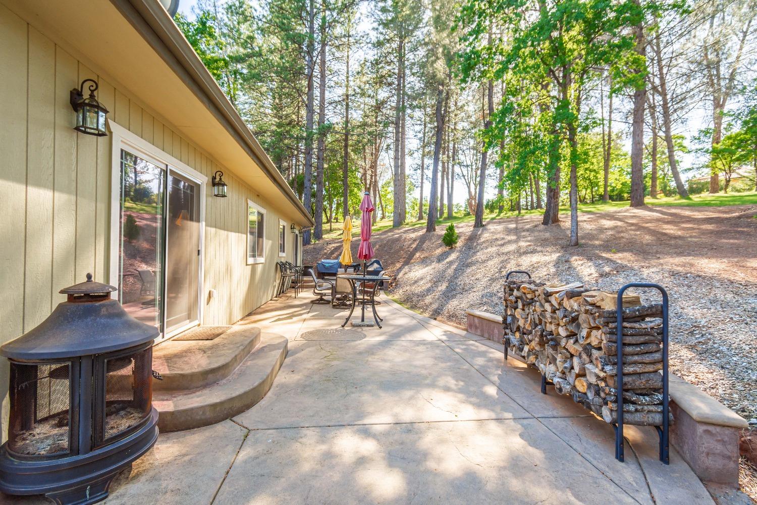 6570 Mosquito Road Placerville, CA 95667 - Photo 43 of 56 a view of a house with backyard and sitting area