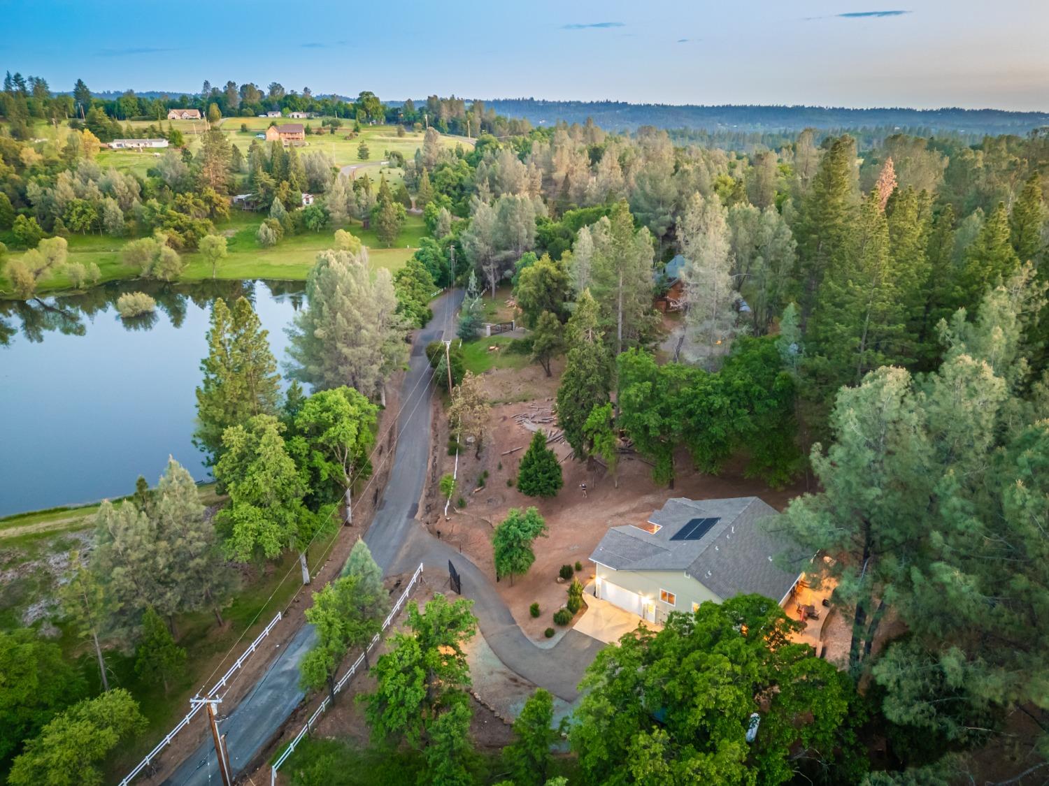 6570 Mosquito Road Placerville, CA 95667 - Photo 46 of 56 an aerial view of residential houses with outdoor space and trees all around