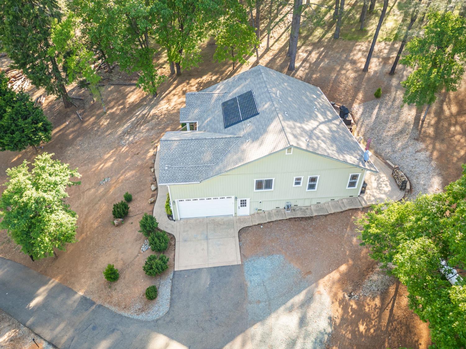 6570 Mosquito Road Placerville, CA 95667 - Photo 47 of 56 an aerial view of a house with a yard and a large tree