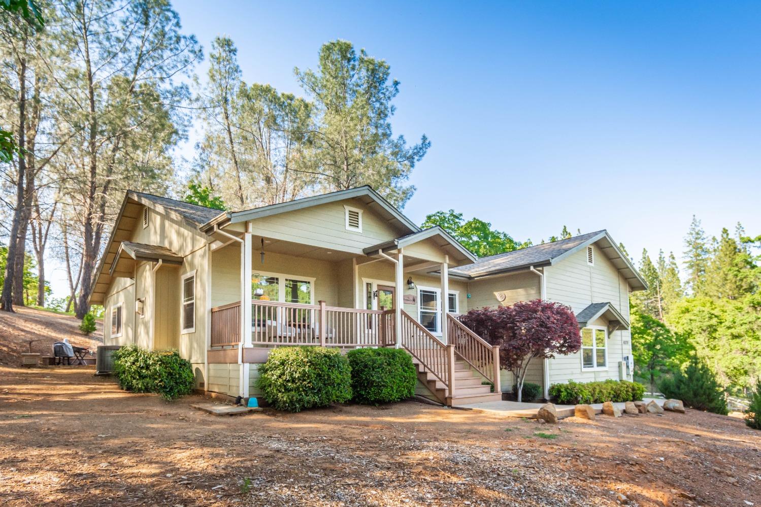 6570 Mosquito Road Placerville, CA 95667 - Photo 7 of 56 front view of a house with a yard