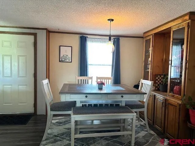 a view of hall way with furniture