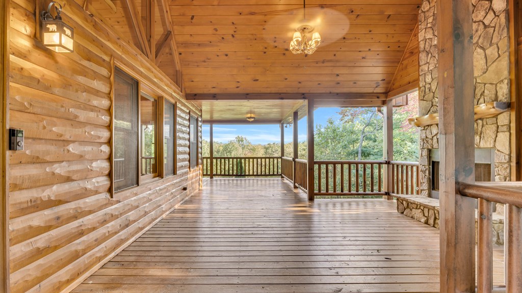 691 Mitchell Branch Road Morganton, GA 30560 - Photo 4 of 77 a view of a patio with wooden floor