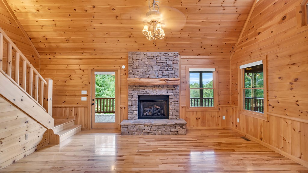 691 Mitchell Branch Road Morganton, GA 30560 - Photo 10 of 77 a view of a livingroom with a fireplace and window