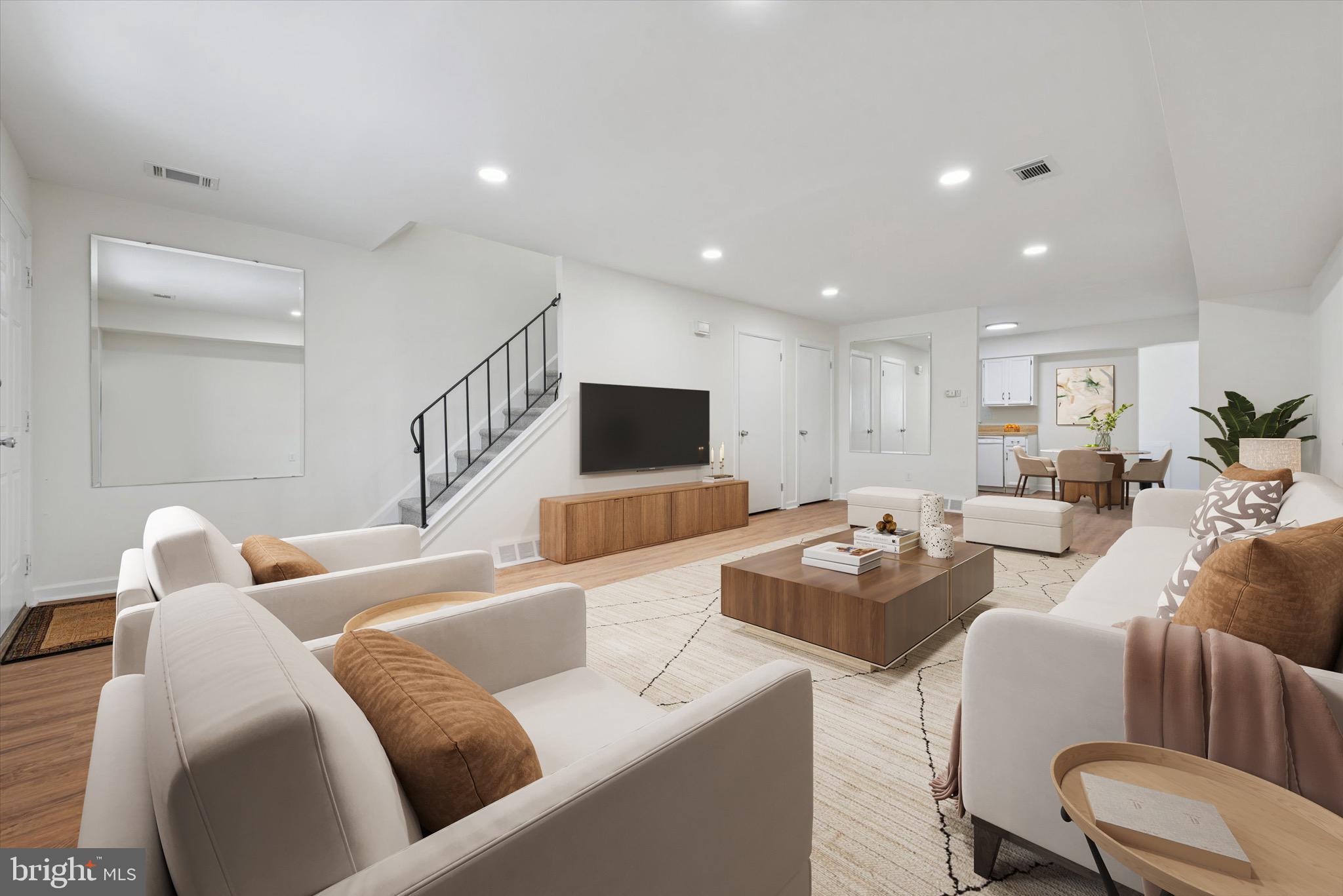 21 Markel Road Malvern, PA 19355 - Photo 3 of 23 a living room with furniture and a flat screen tv