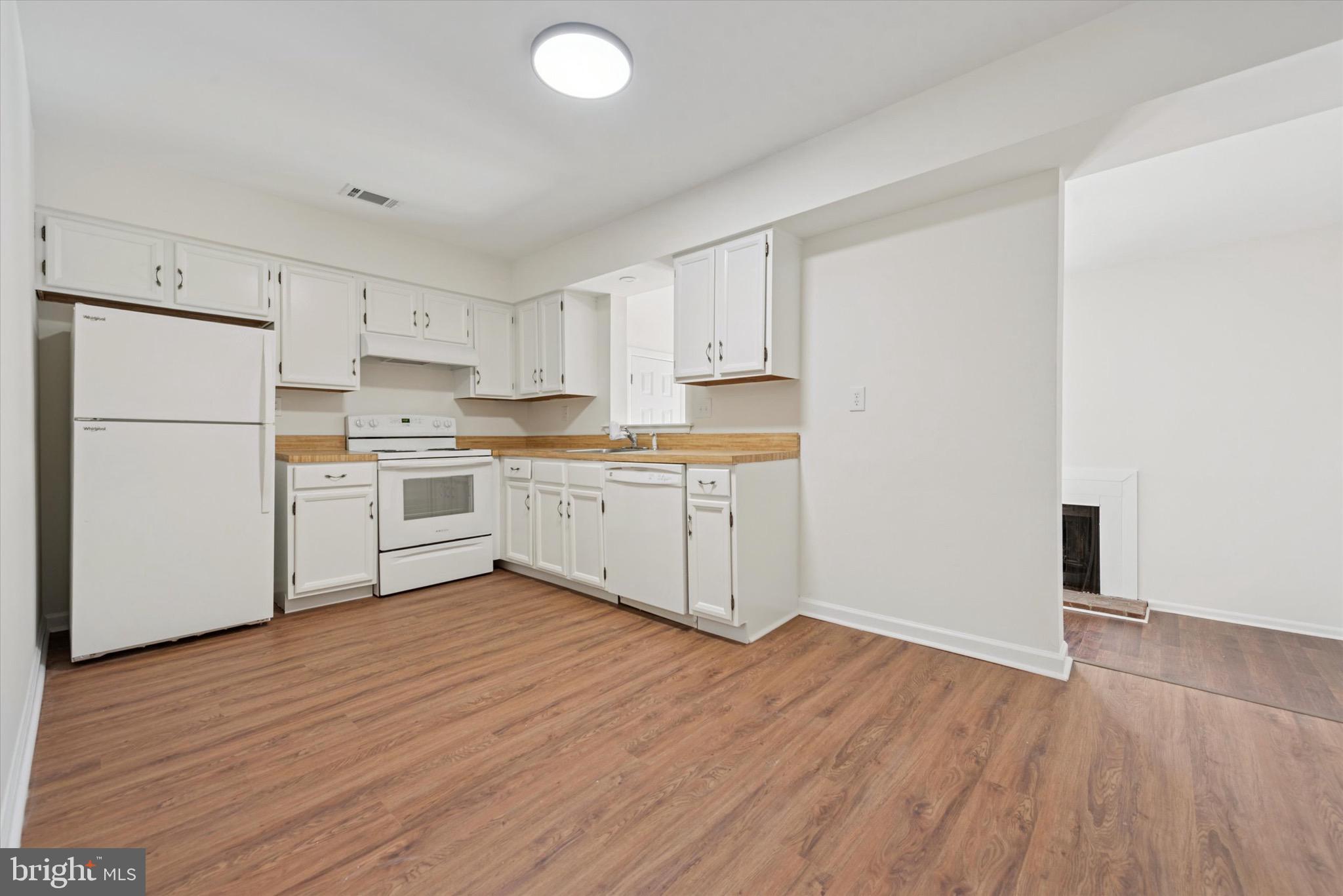 21 Markel Road Malvern, PA 19355 - Photo 6 of 23 a view of kitchen with wooden floor
