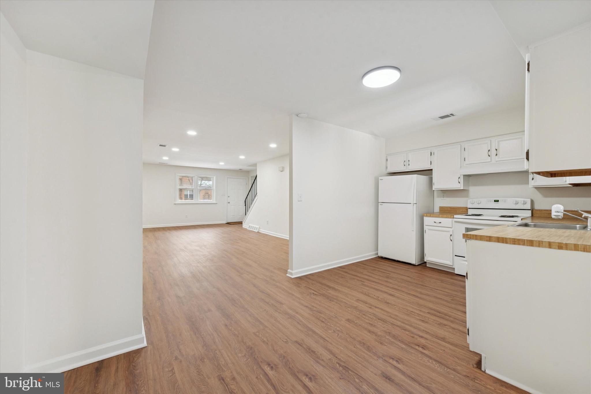 21 Markel Road Malvern, PA 19355 - Photo 8 of 23 a view of kitchen with wooden floor