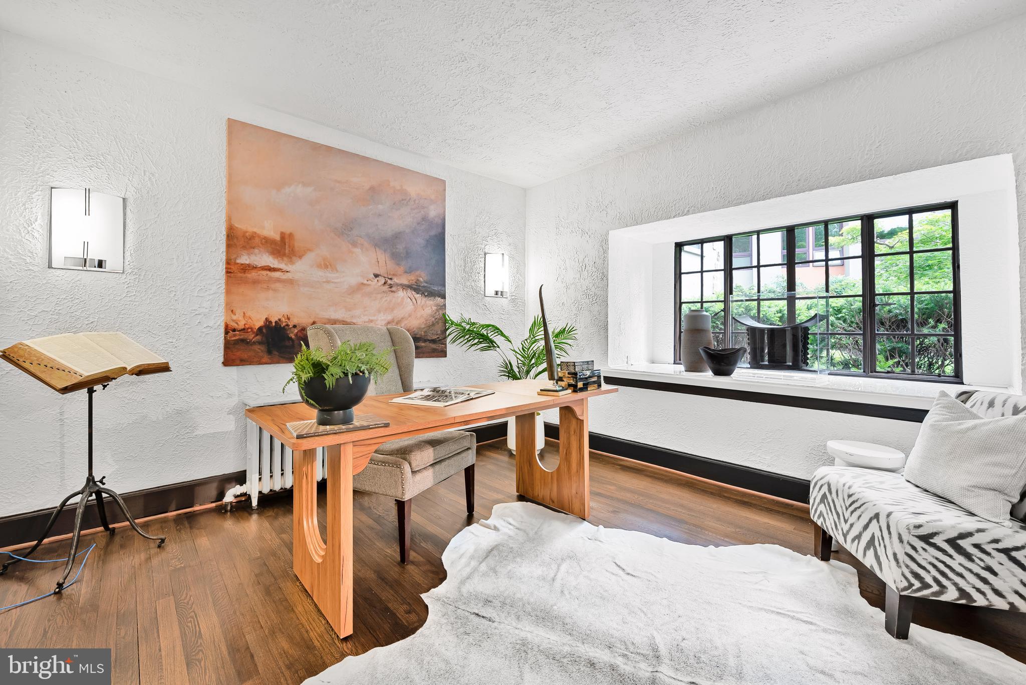 302 Ellsworth Drive Silver Spring, MD 20910 - Photo 21 of 64 a living room with furniture and a large window
