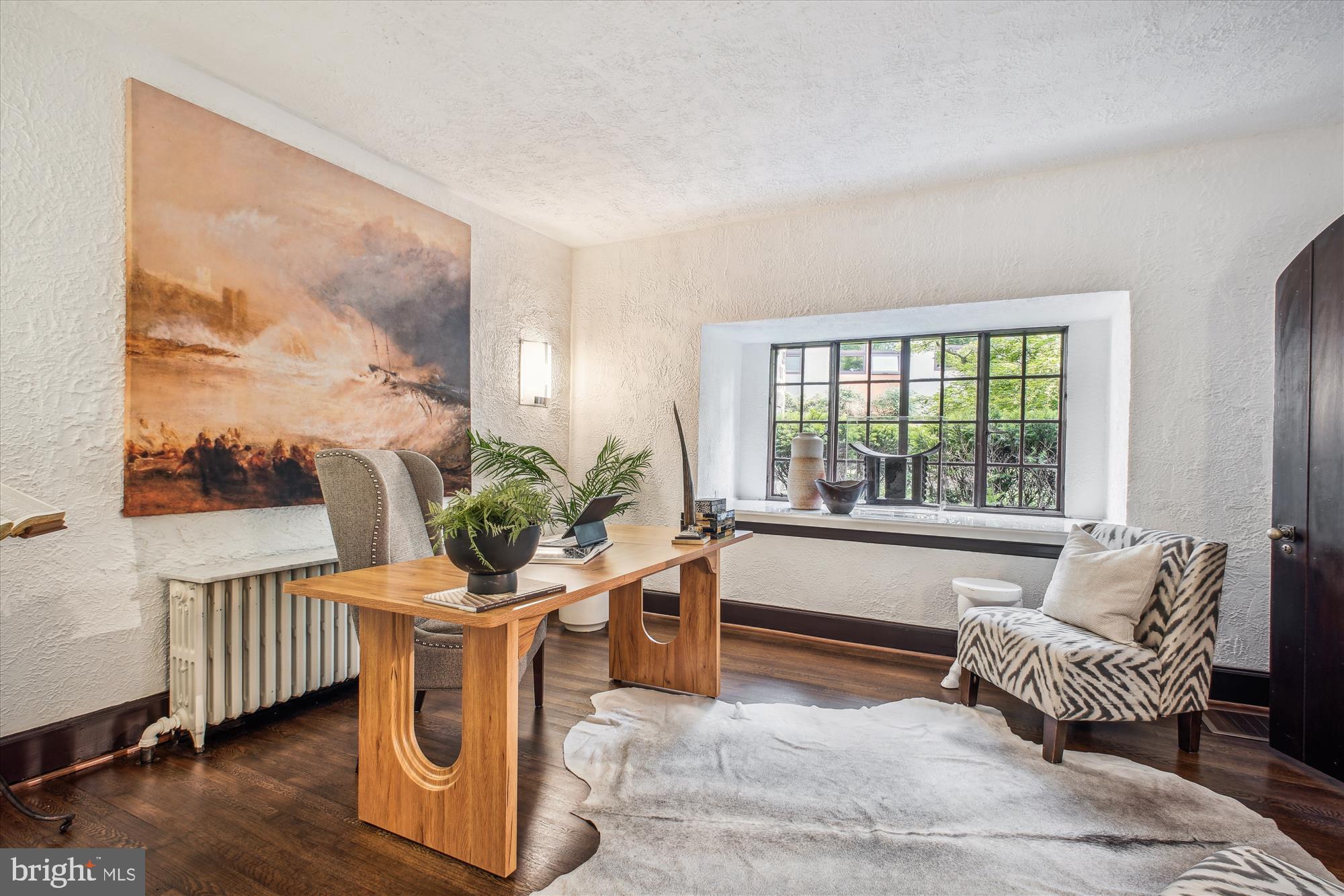 302 Ellsworth Drive Silver Spring, MD 20910 - Photo 22 of 64 a living room with furniture and a large window