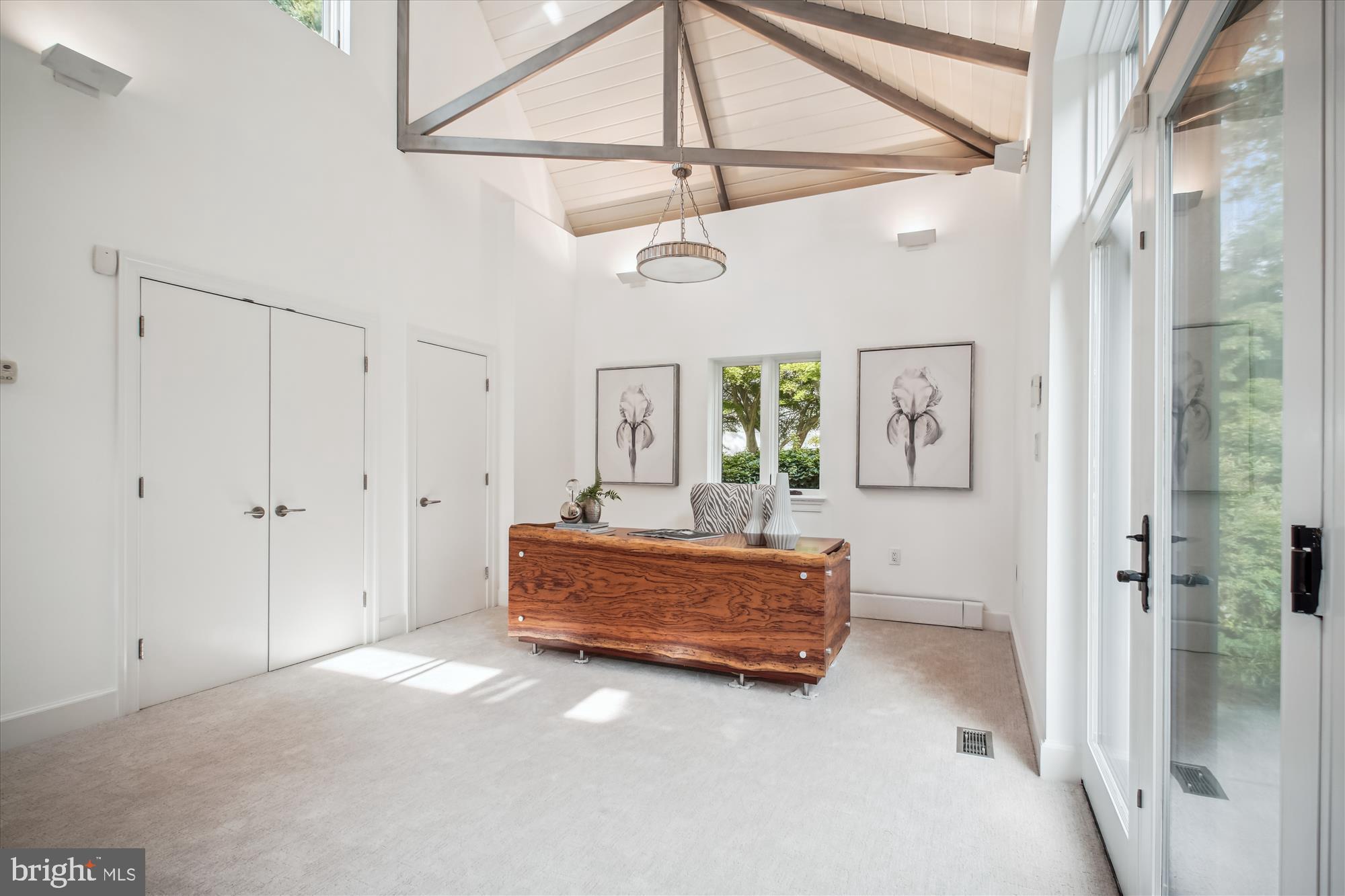 302 Ellsworth Drive Silver Spring, MD 20910 - Photo 25 of 64 a living room with furniture and a chandelier