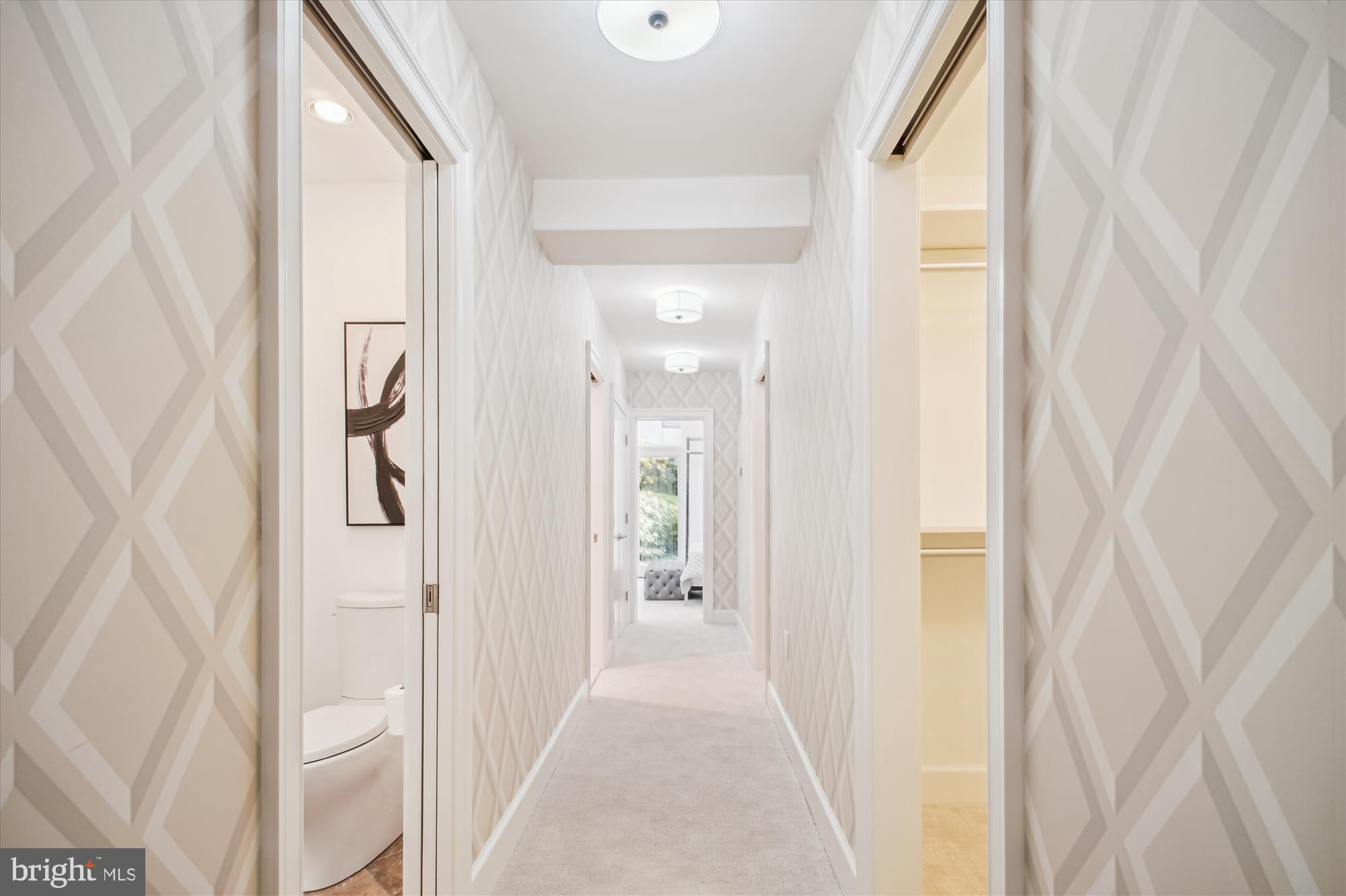 302 Ellsworth Drive Silver Spring, MD 20910 - Photo 26 of 64 a view of a hallway with wooden floor and closet