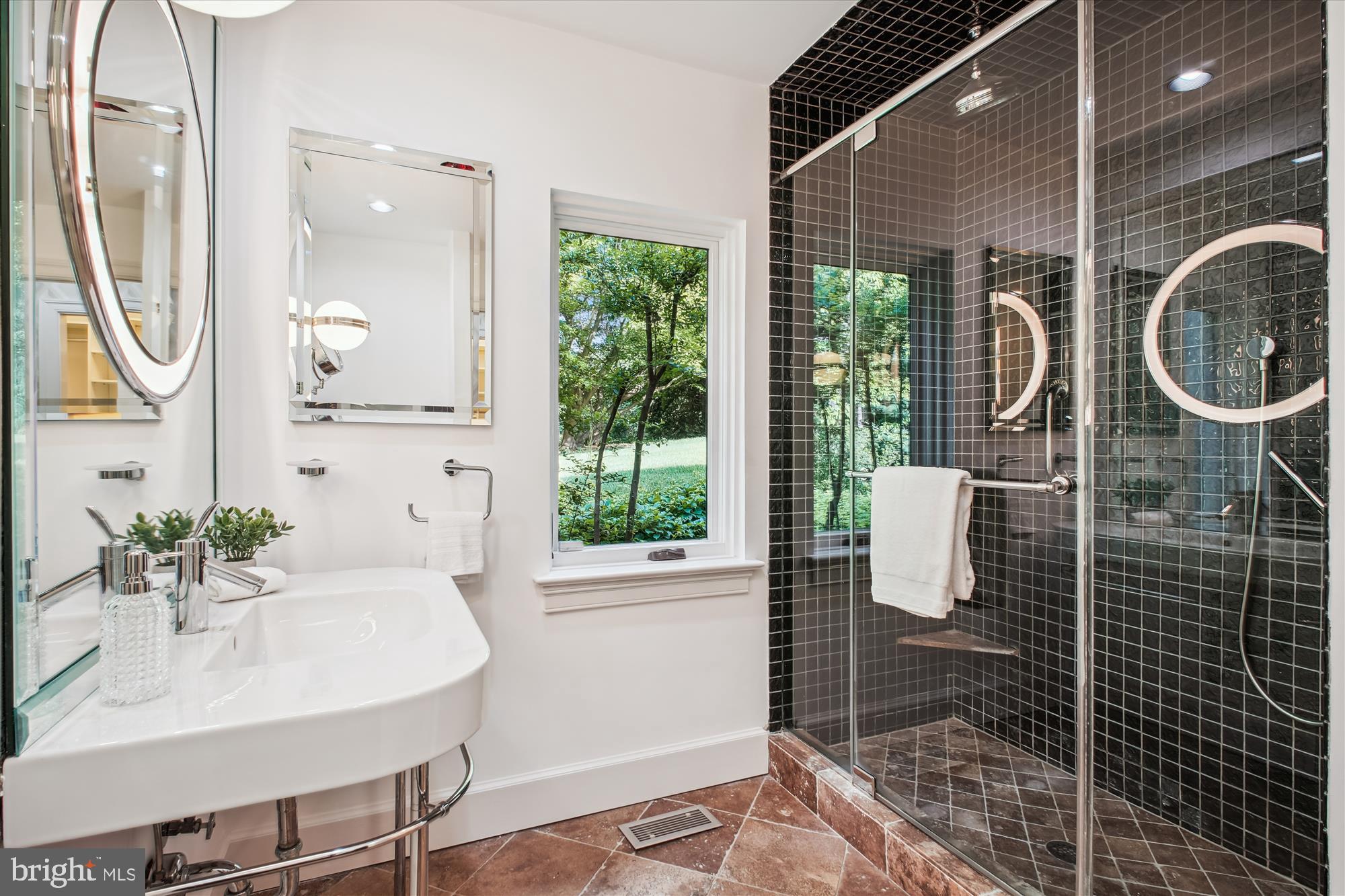 302 Ellsworth Drive Silver Spring, MD 20910 - Photo 27 of 64 a bathroom with a sink toilet and shower