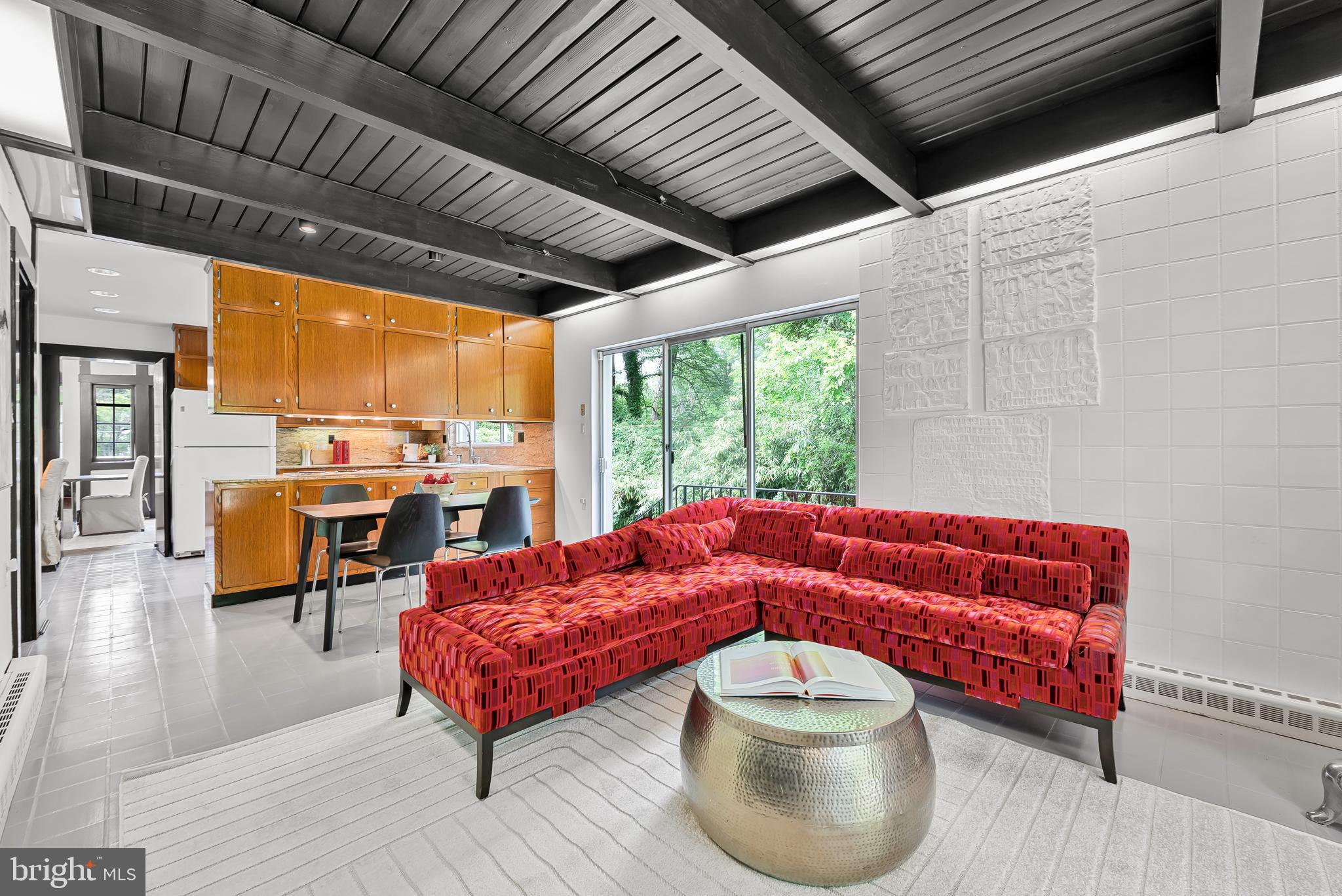 302 Ellsworth Drive Silver Spring, MD 20910 - Photo 37 of 64 a living room with furniture and a large window