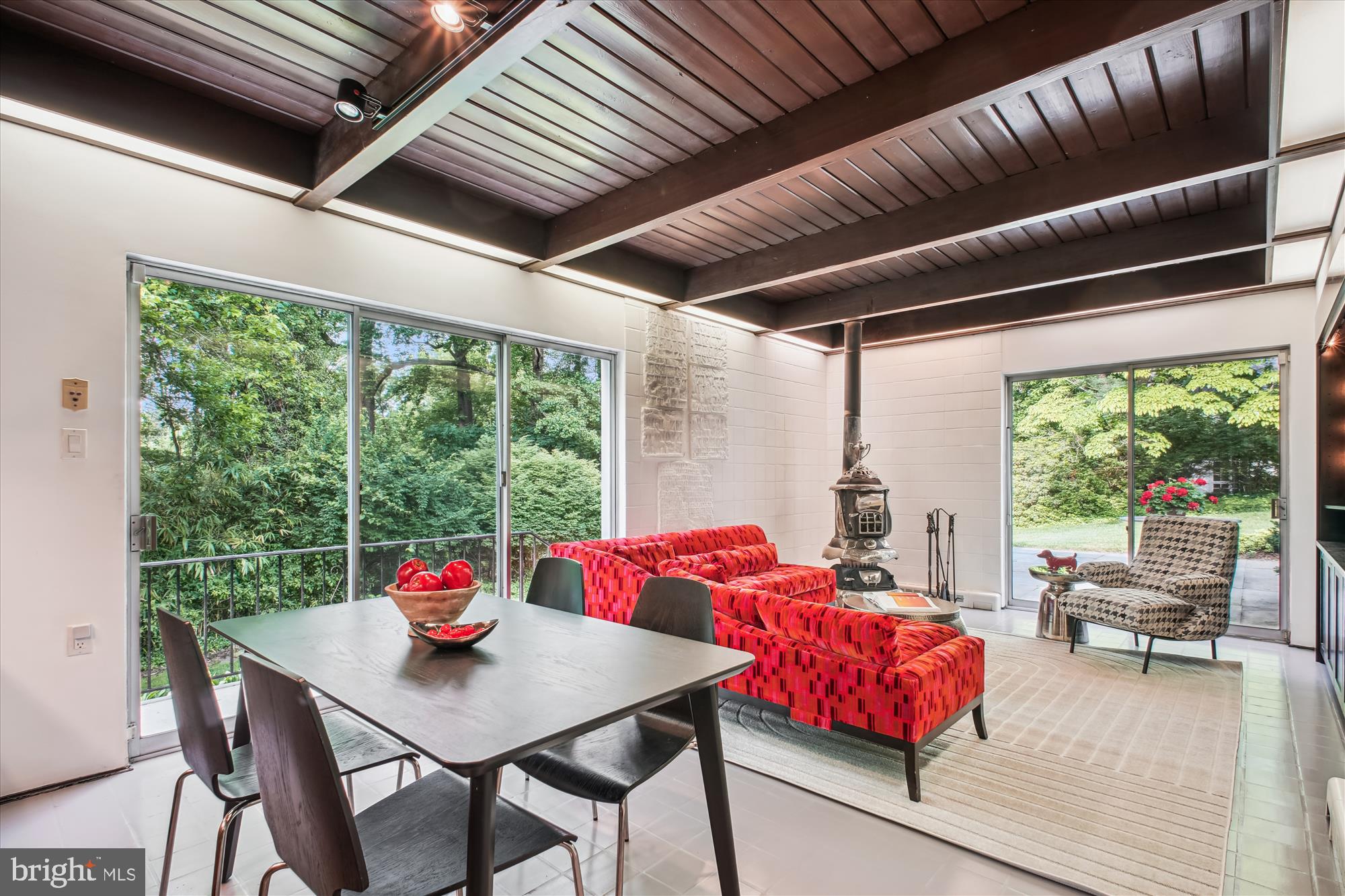 302 Ellsworth Drive Silver Spring, MD 20910 - Photo 39 of 64 a living room with furniture and a large window